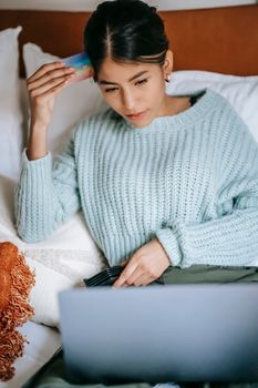 Young female shopping online. Your marketing is important at every stage of the buying journey.